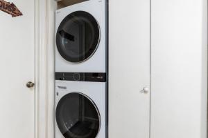 two washing machines in a white wall at Mountain Calling - Resort Pool, WIFIO, 685 FREE tickets each paid day!!! in Gatlinburg