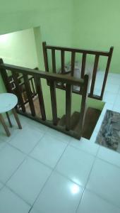 Postel nebo postele na pokoji v ubytování Villa Oemah Ijo