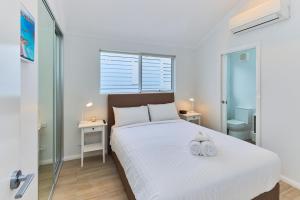 RAC Esperance Holiday Park客房内的一张或多张床位