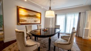 a dining room with a table and chairs at InterContinental Bali Resort, an IHG Hotel in Jimbaran