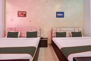 Cama ou camas em um quarto em Tiger View Hotel