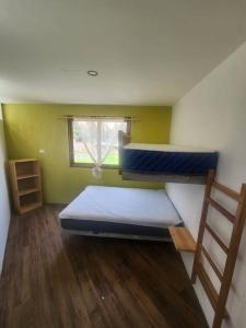 Ένα ή περισσότερα κρεβάτια σε δωμάτιο στο Bella Casa de Campo