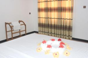 Letto o letti in una camera di Sigiri Sanu Villa