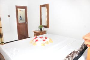 Letto o letti in una camera di Sigiri Sanu Villa