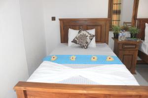 Letto o letti in una camera di Sigiri Sanu Villa