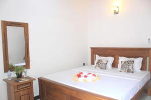 Letto o letti in una camera di Sigiri Sanu Villa