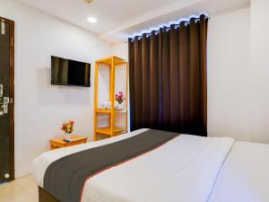 Кровать или кровати в номере Hotel Green Majestic