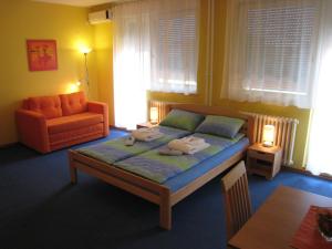 En eller flere senge i et værelse på Spirit Apartments