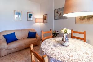 Posezení v ubytování Fener de Dalt 87 apartamento con wifi y piscina