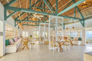 Restaurace v ubytování Tropical Attitude (Adults Only)