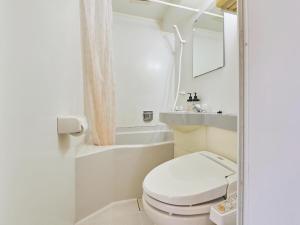 Koupelna v ubytování Kumagaya Royal Hotel Suzuki
