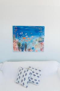 Postel nebo postele na pokoji v ubytování Villa Il Paradiso Andros