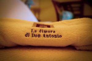 Postel nebo postele na pokoji v ubytování La dimora di Don Antonio