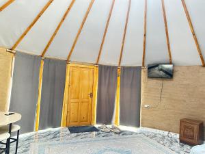 Postel nebo postele na pokoji v ubytování Eco Resort Kaiyrma
