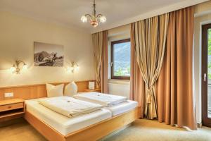 Krevet ili kreveti u jedinici u okviru objekta Hotel zum Lamm