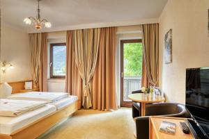TV i/ili multimedijalni sistem u objektu Hotel zum Lamm