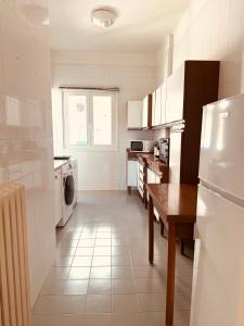 A kitchen or kitchenette at Guest Corso Italia