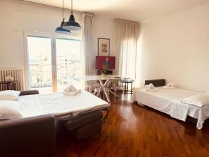 A bed or beds in a room at Guest Corso Italia