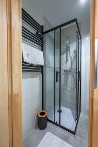 a shower with a glass door in a bathroom at Rykowisko Korbielów 2 in Korbielów +11 photos