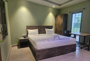 Postel nebo postele na pokoji v ubytování Hotel Peppers