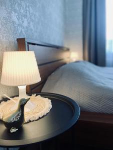 Ένα ή περισσότερα κρεβάτια σε δωμάτιο στο Quiet apartments