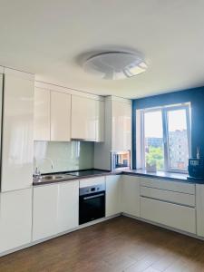 Η κουζίνα ή μικρή κουζίνα στο Quiet apartments