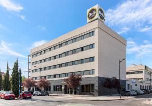 a building with a clock tower on top of it at B&B HOTEL Madrid Getafe in Getafe