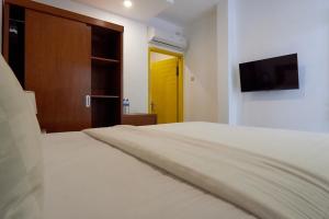 Postel nebo postele na pokoji v ubytování Attara Inn Senggigi