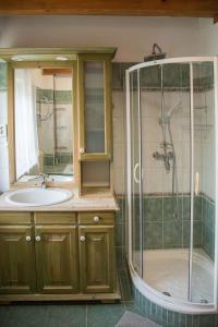 a bathroom with a shower and a sink and a tub at Apartment in Balatonbereny - Balaton 18043 in Balatonberény