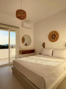 Postel nebo postele na pokoji v ubytování Yara Residence + 37 fotografií