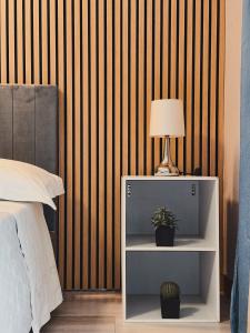 A bed or beds in a room at Catanese Proverb's House - Via Napoli - Ground Floor
