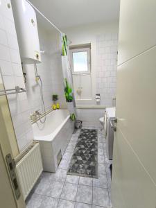 Koupelna v ubytování Apartman Braun Čačak + 28 fotografií