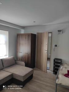 Posedenie v ubytovaní Eye of the Tiger. Apartament w centrum Mrągowa. + 26 fotografií