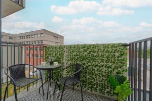 Balkón alebo terasa v ubytovaní Modern Studio Słonimskiego with Balcony by Noclegi Renters