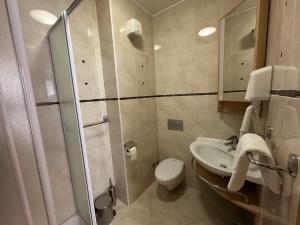 Kúpeľňa v ubytovaní Pool Apartment Galeb
