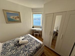 Posteľ alebo postele v izbe v ubytovaní Pool Apartment Galeb
