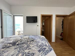 Posteľ alebo postele v izbe v ubytovaní Pool Apartment Galeb