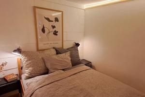 Ένα ή περισσότερα κρεβάτια σε δωμάτιο στο Chill Garden Loft