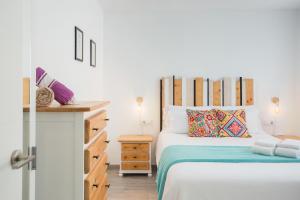 Posteľ alebo postele v izbe v ubytovaní Apartamento Jávea Puerto