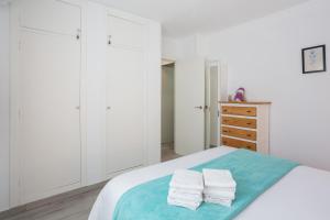 Posteľ alebo postele v izbe v ubytovaní Apartamento Jávea Puerto