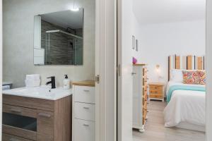 Posteľ alebo postele v izbe v ubytovaní Apartamento Jávea Puerto