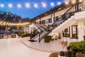 a house with a staircase and a patio at The Mansion Boutique Hotel in Mabalacat