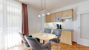 Kuchyň nebo kuchyňský kout v ubytování Apartmenthaus Binzer Sterne Haus 1