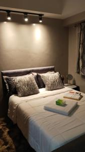 Postel nebo postele na pokoji v ubytování Nesting Lounge Two at MonteCarlo Residenze