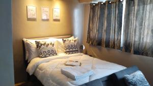 Postel nebo postele na pokoji v ubytování Nesting Lounge Two at MonteCarlo Residenze