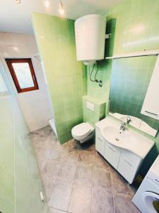 Koupelna v ubytování Apartments Kordić