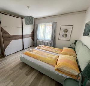 Postel nebo postele na pokoji v ubytování Ascona Casa Cristina