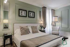Postel nebo postele na pokoji v ubytování HOTIDAY Room Collection - Napoli Diaz