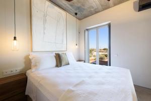 Ένα ή περισσότερα κρεβάτια σε δωμάτιο στο Villa Iparenia +10 φωτογραφίες