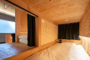 Postel nebo postele na pokoji v ubytování CONTEXTED-Sora SORA - Vacation STAY 77999v